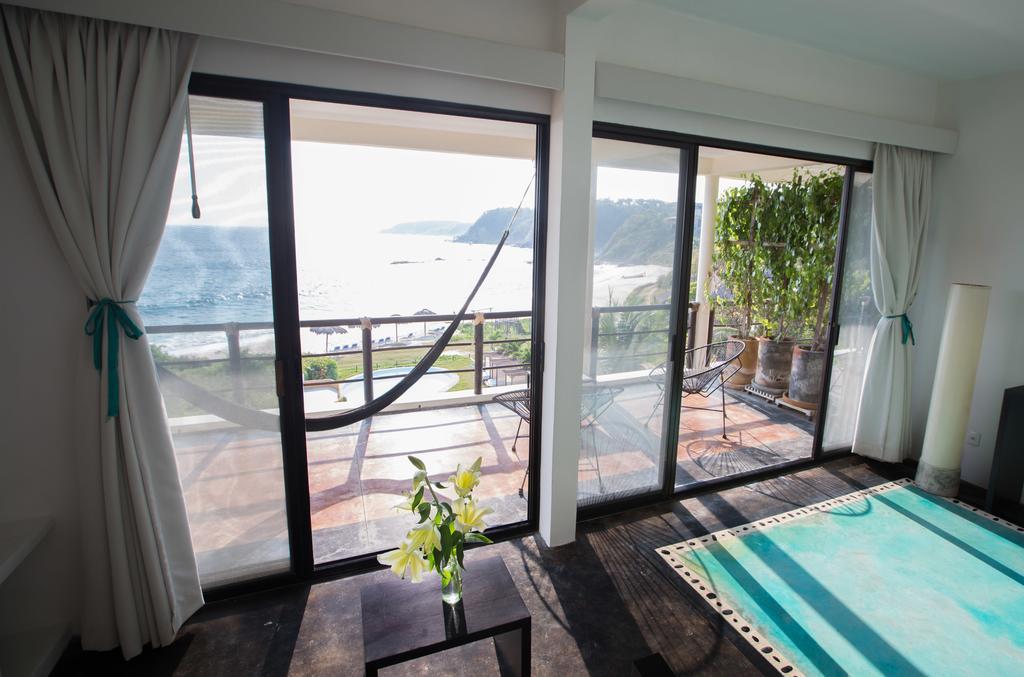 Manta Raya Hotel - Right On The Beach Cuatunalco Buitenkant foto